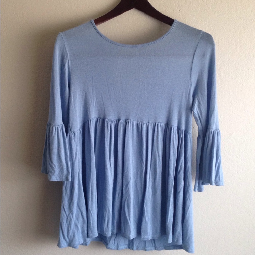 Bell sleeved top